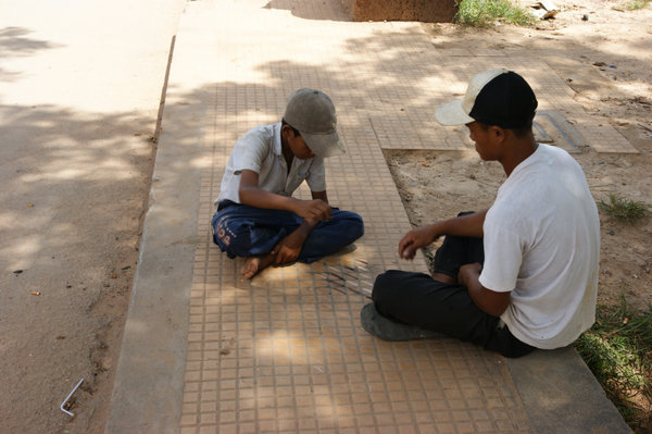 people playing a game in the street