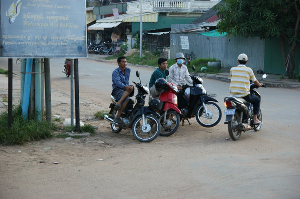 motos waiting in street