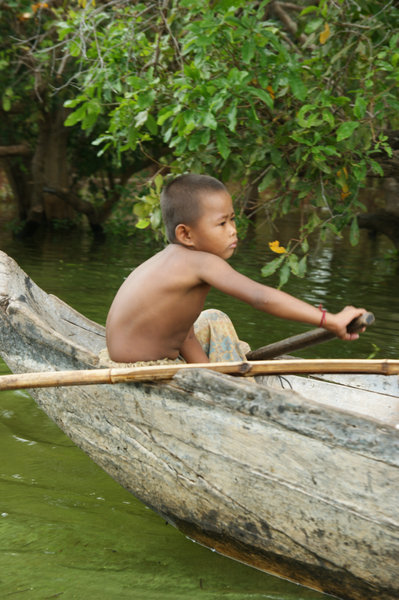 child in boat
