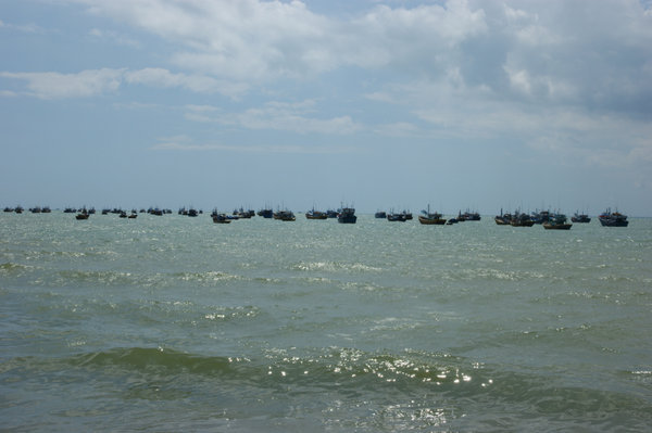 fishing boats on horizon