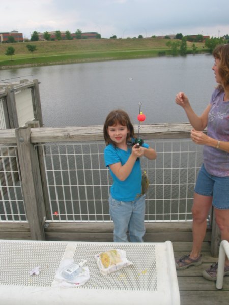 Caroline catching a blue gill