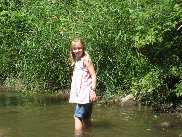 wading in Plum Creek by Laura's dugout home