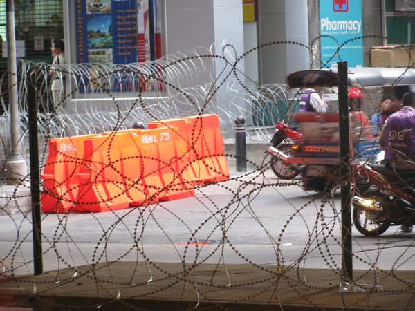 Razor wire along Silom Road