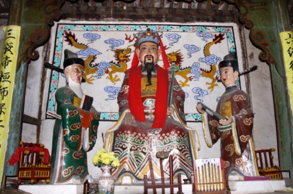 Buddhism, Confusianism, Taoism and in front the local god. Together in one temple is unique in China