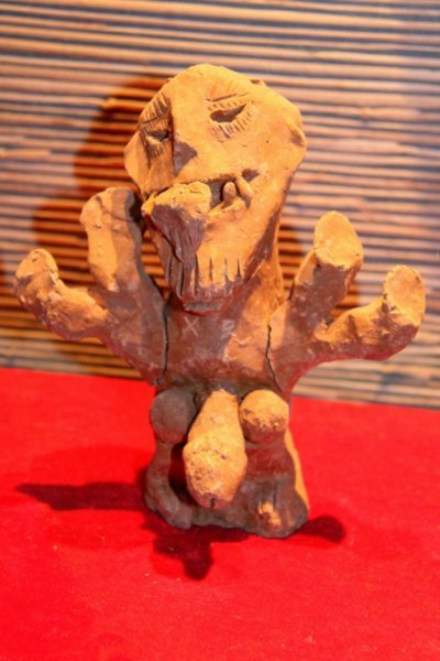 Old clay puppet  for witchcraft
