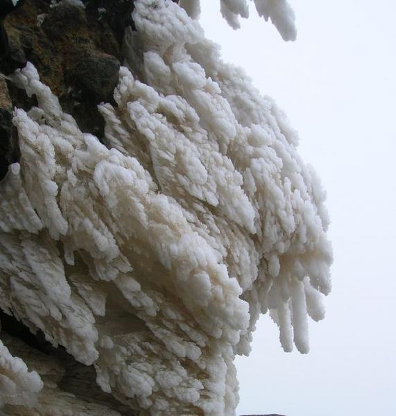 Ice Crystals Hanging From A Rock
