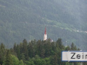 church on a hill in the austrian alps