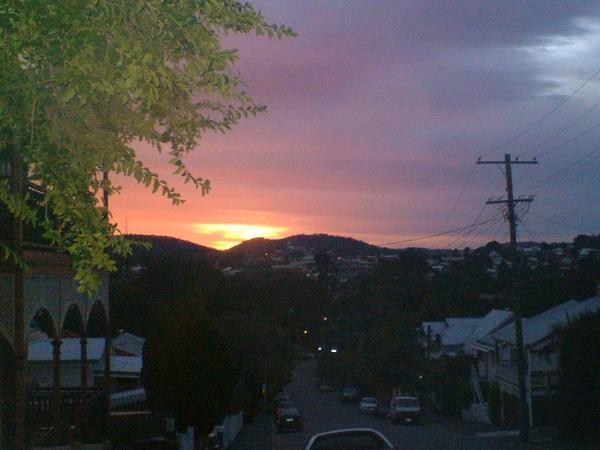 Sunset last night  in Brisbane. The veranda on the left of the photo is our hostel