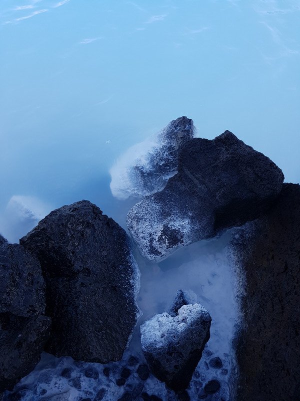 Lava rocks around the water's edge