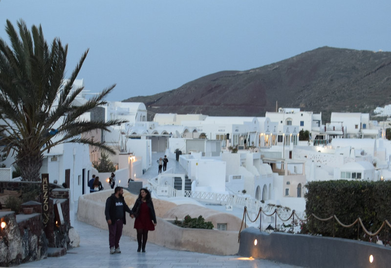 Couple in Oia at night