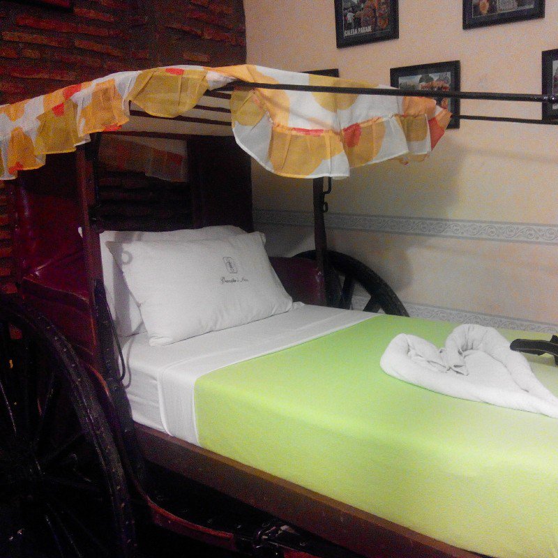 My Calesa Bed in Grandpas Inn in Vigan