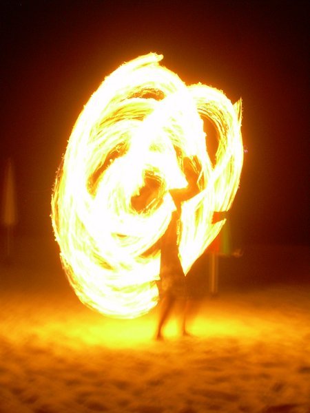 Fire dancing on the beach