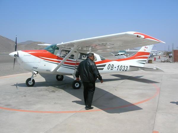 Plane and pilot over Nasca