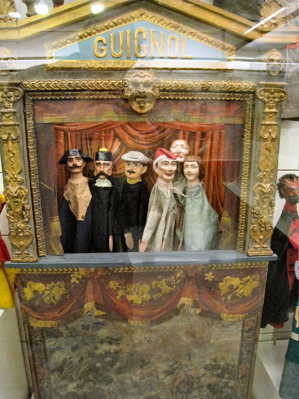Puppets in their theater