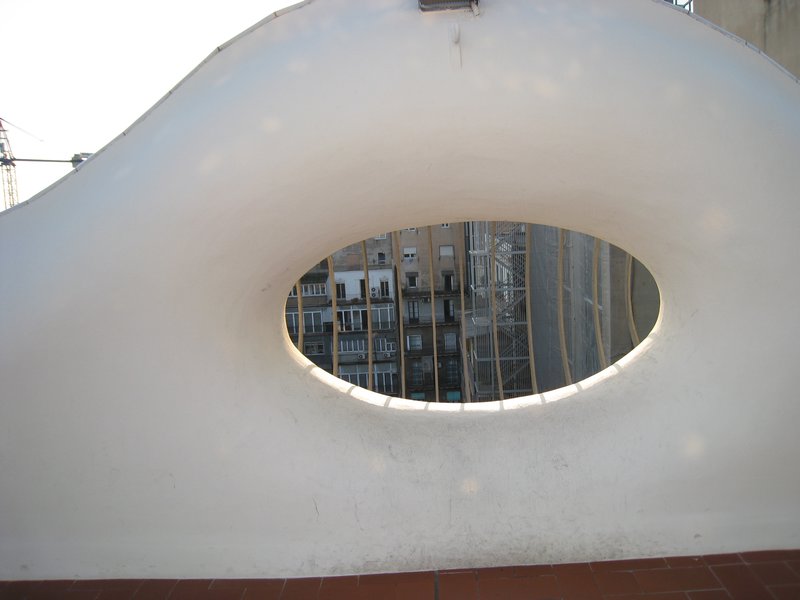 Eye in wall of rooftop patio
