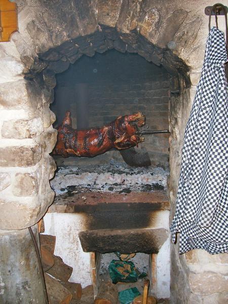 The Pig Being Roasted