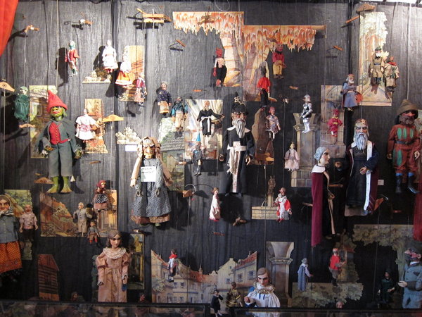 A Wall of Puppets