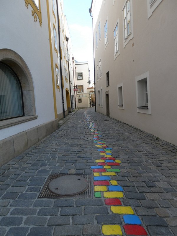 The colourful path leads people through the art quarter to the galleries and other arty places.