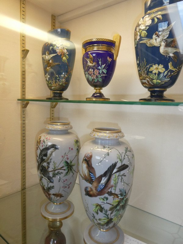 Birds and flowers painted on vases