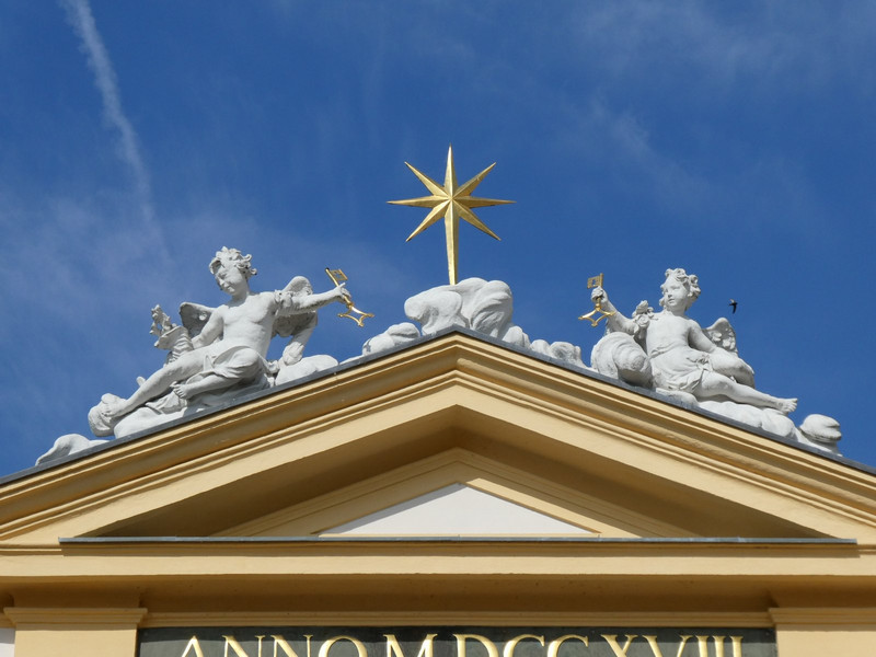 Angels and stars oversee the goings on.