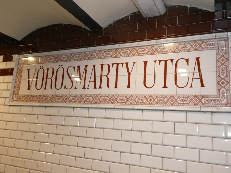 The decor of the first underground is tiles and fancy station names.