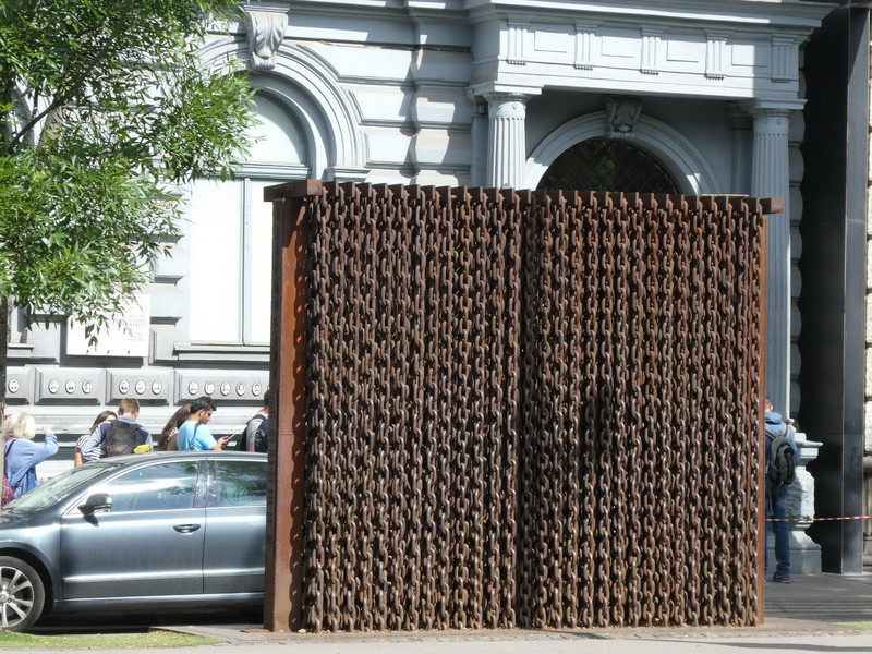 This sculpture outside the House of Terror is made of heavy chain covering a wall.