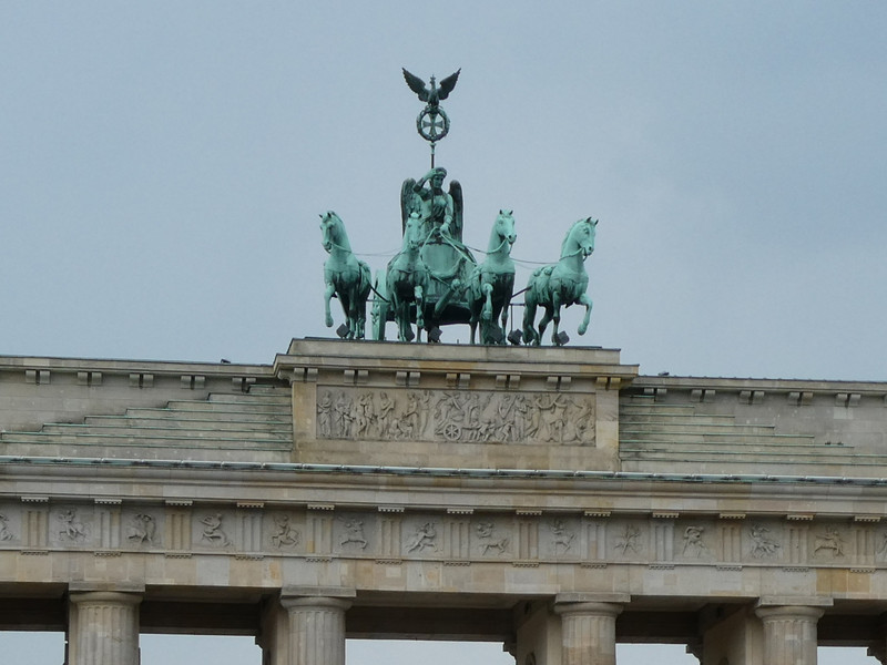 The Quadriga atop the Brandenburg Gate: 4 horses drawing a woman in a chariot