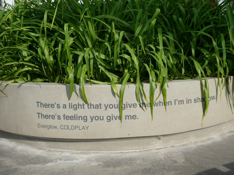 Lines from various songs, this one by Coldplay, garnished the circular gardens.