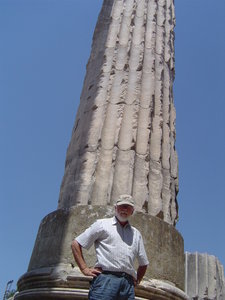 Phil demonstrates size of pillars at the Temple of Apollo