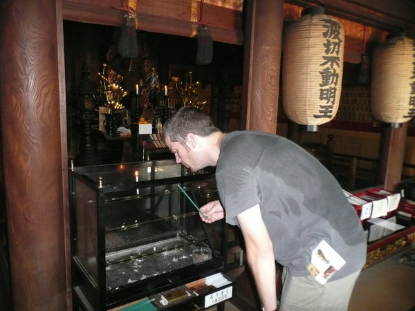 Lighting incense at the temple