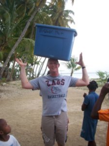 Nathan (a leader of the WA team), with a bin of sports equipment we packed and brought down.