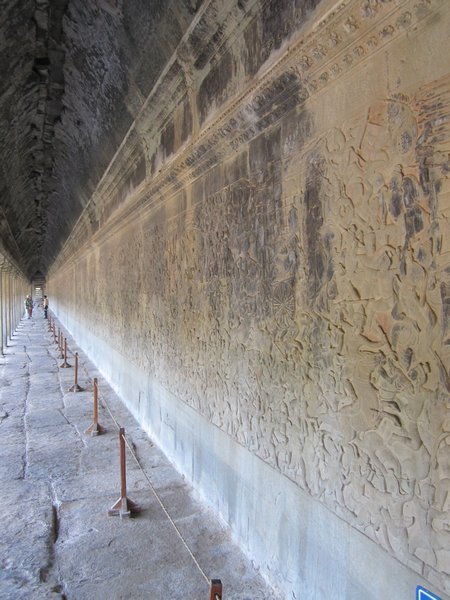 The Gallery of Bas Reliefs is covered in carvings and continues all around the temple