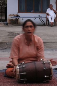 Lalita Ji Drumming During Puja