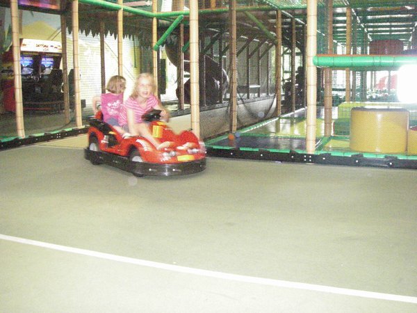 J.. and J.. on racing car