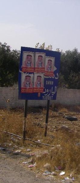 Election posters blocking road signs