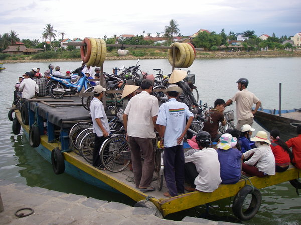 Local ferry with bikes and motorbikes