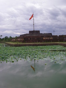 Hue Citadel behind moat with Lotus flowers