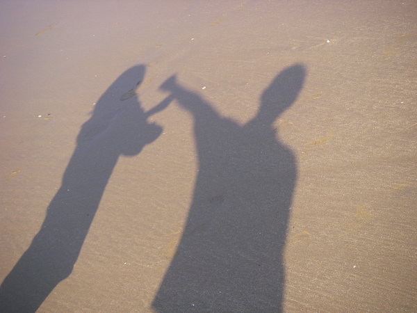 Shadow boxing on the sand