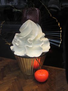 Giant plastic cupcake