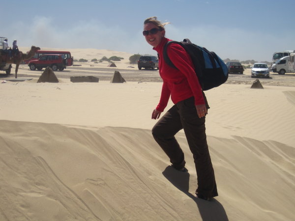 JP climbing a wee sand dune