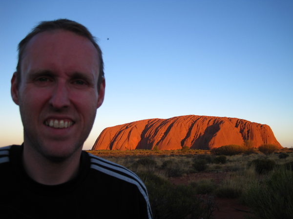 By Uluru at sunset