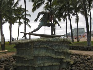 surfing statue