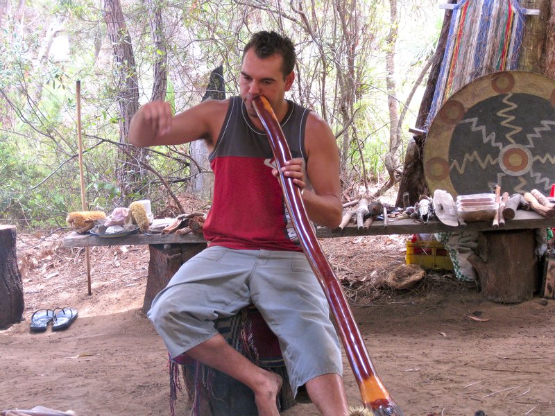 playing the didgeridoo