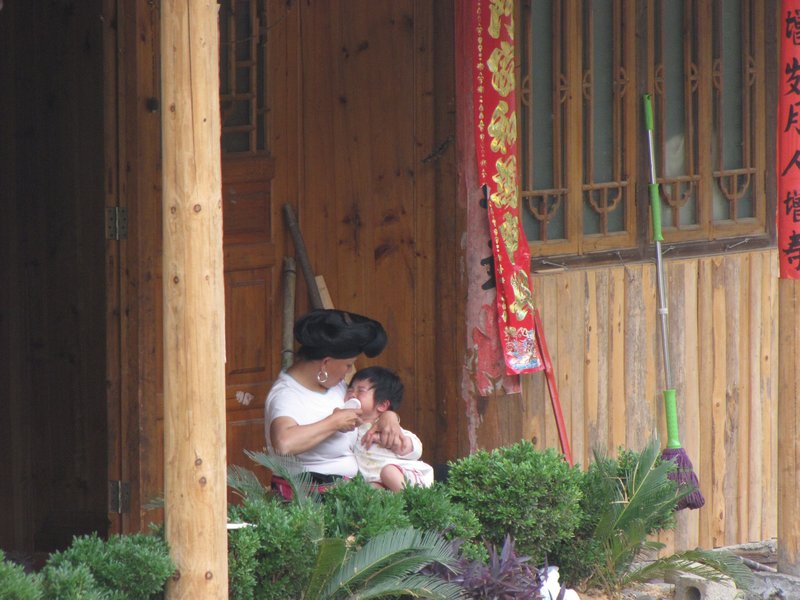 Miao women with baby