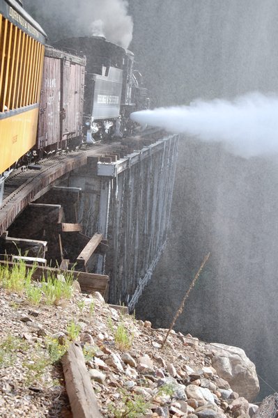 Blowing off Steam Over a Trestle Bridge