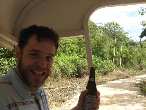 Andrew Enjoys Belizean Beer