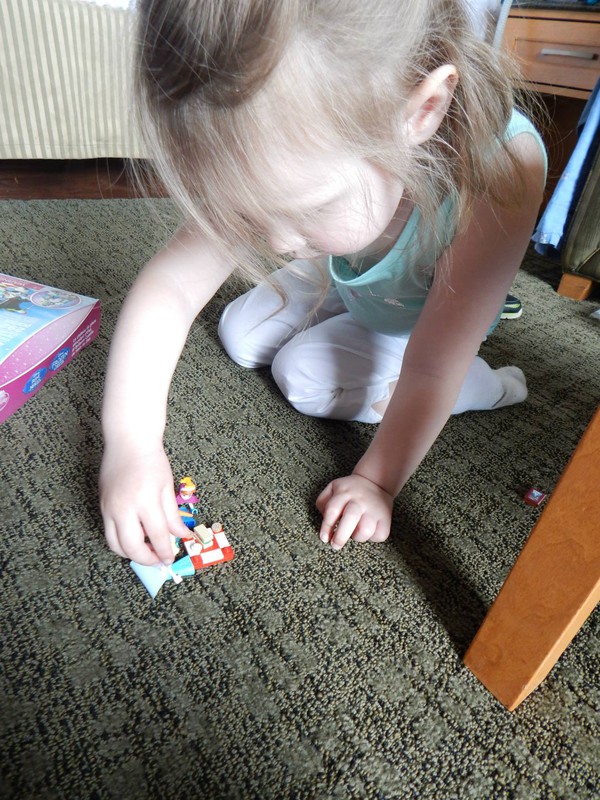 Jo plays picnic with the LEGO set