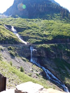 Waterfall flowing through Going-to-the-Sun Road