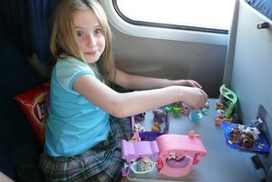 Lucyand her dolls enjoyed the train trips