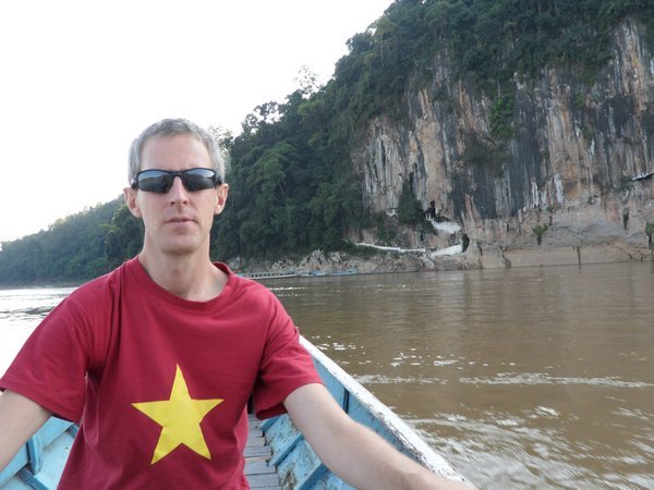 Boat trip across the river to Pak Ou Caves